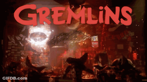 Gremlins Movie Poster Gremlin In Dark Room GIF