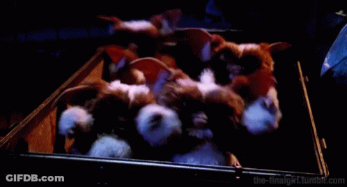 Gremlins Movie Poster Gremlin In Dark Room GIF