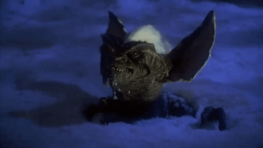 Gremlins Snow Hiding Bye GIF