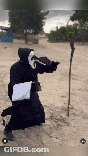 Grim Reaper Holding Book And Scythe GIF