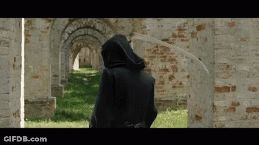 Grim Reaper Holding Scythe Turning Around GIF