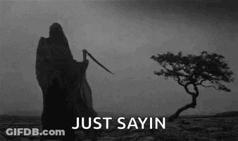 Grim Reaper In Desert With Scythe GIF