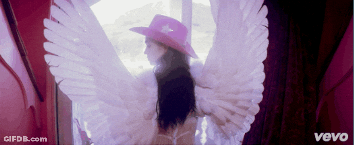 Grimes With Angel Wings GIF