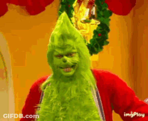 Grinch Awkward Smile Nodding GIF
