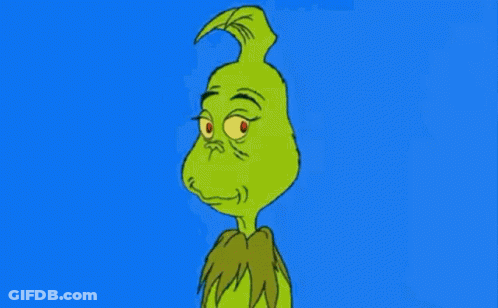 Grinch Cartoon Character With Green Hair And Red Eyes GIF