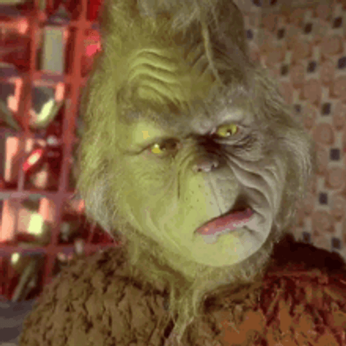 Grinch Irritated And Frustrated Smile GIF