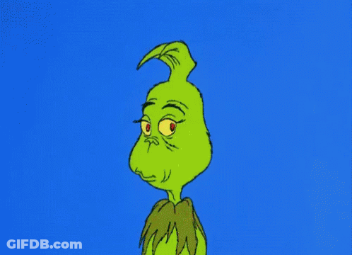 Grinch Making Funny Face On Blue Background GIF