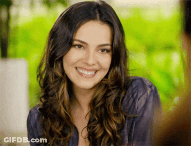 Grinning Girl Slow Wink GIF