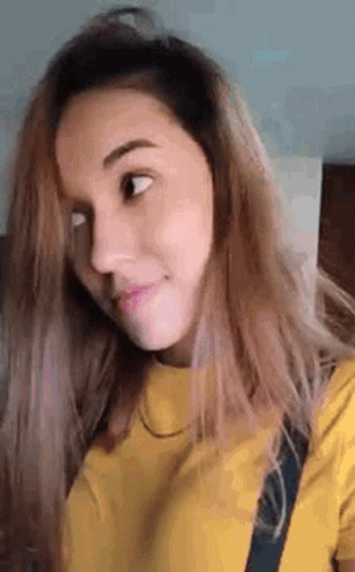 Grinning Girl Zooming In GIF