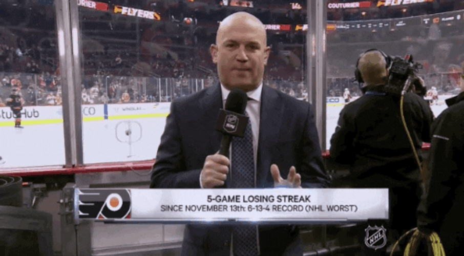 Gritty Hilariously Jumps At Reporter GIF