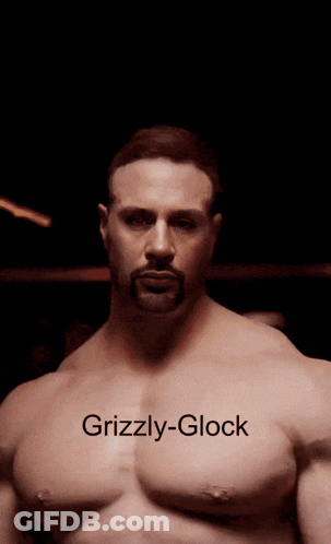 Grizzly-Glock Is Written On The Chest Of A Man GIF