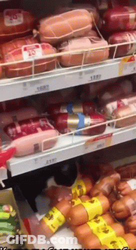 Grocery Shelf Filled With Sausages And Meats GIF