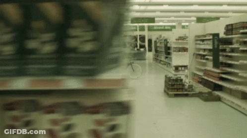 Grocery Store Aisle Sign About Us GIF