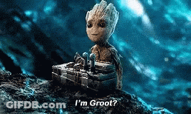 Groot Sitting On Rock Holding Box GIF
