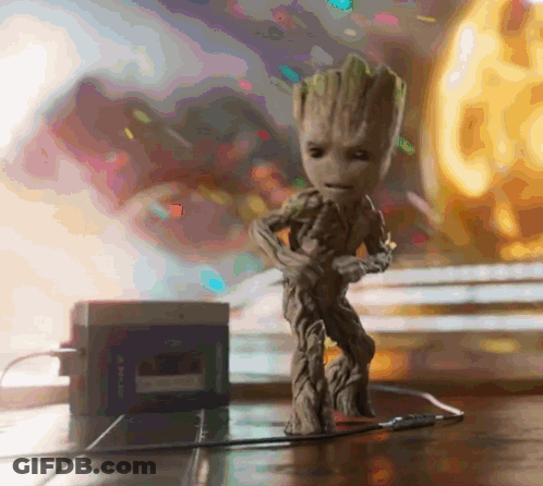 Groot Statue On Wooden Table GIF