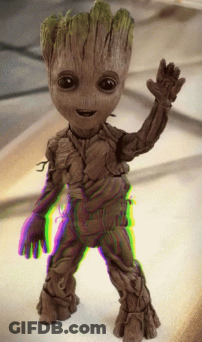 Groot Statue With Rainbow Background GIF