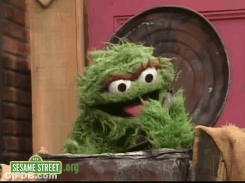 Grouch Couch Box On Red Couch GIF