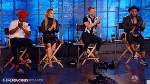 Group Applauding In Director's Chairs GIF