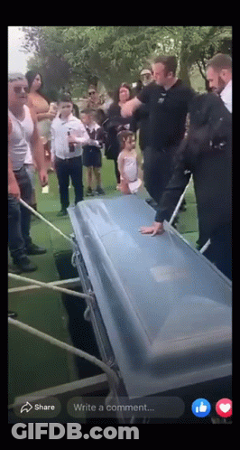 Group Around Coffin Write A Comment GIF