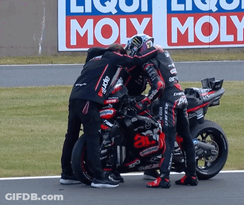 Group Around Motorcycle Saying Aprilia GIF