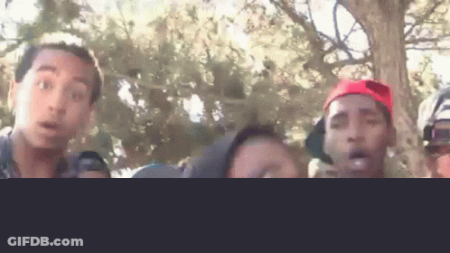 Group Around Woman In DGK Shirt GIF