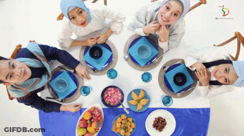 Group At Table With Food And SD Watermark GIF