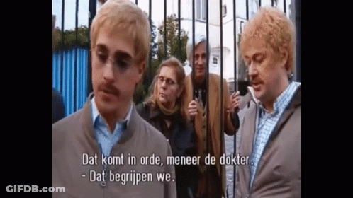 Group Behind Fence Saying Dat Komt In Orde GIF