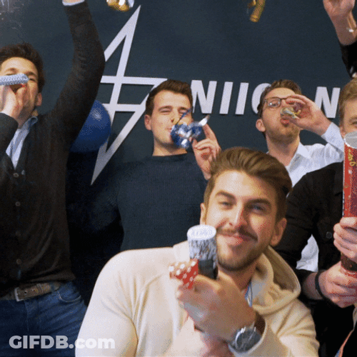 Group Celebration With Party Popper GIF