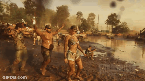 Group Covered In Mud Dancing With Mud Text GIF