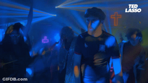 Group Dancing In Dark Room Ted Lasso GIF