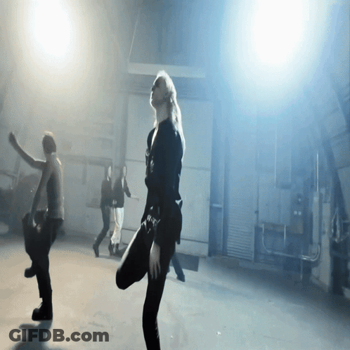Group Dancing In Dark Room With A Shirt GIF