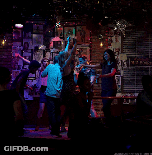 Group Dancing In Front Of Big Board GIF