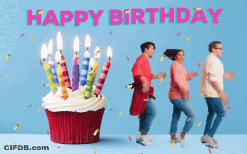 Group Dancing In Front Of Birthday Cupcake GIF