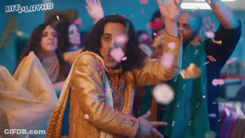 Group Dancing In Front Of Bitplayas Sign GIF