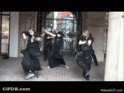 Group Dancing In Front Of Building GIF