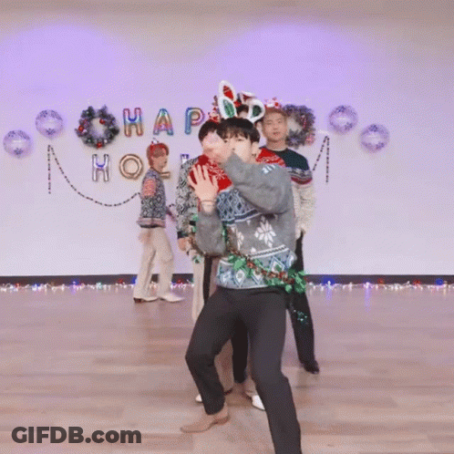 Group Dancing In Front Of Happy Wall GIF