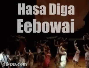 Group Dancing In Front Of Hasa Diga Eebowai Sign GIF