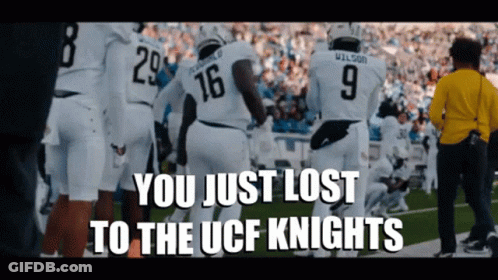 Group Dancing In Front Of Knight Mascot GIF