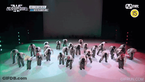 Group Dancing In Front Of Mnet Sign GIF