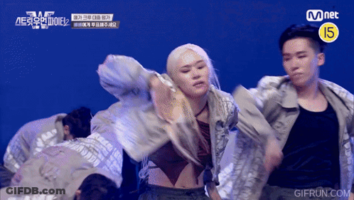 Group Dancing In Front Of Mnet Sign GIF