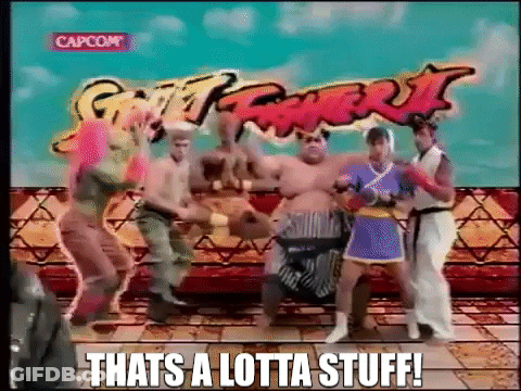 Group Dancing In Front Of Street Fighter II Sign GIF