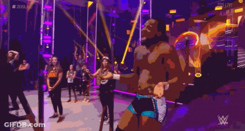 Group Dancing In Front Of Wrestling Logo GIF