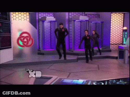 Group Dancing In Front Of XD Sign GIF