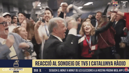 Group Dancing In Front Of Yellow Banner Saying Reaccion Al Sondeg De TV3 I Catalunya Radio GIF
