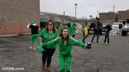 Group Dancing In Parking Lot With Irish Sign GIF