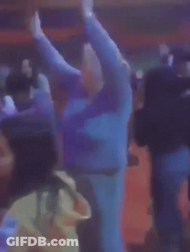 Group Dancing In Purple Lights GIF
