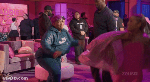 Group Dancing In Purple Lights With Zeusa GIF