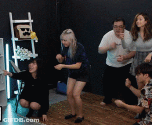 Group Dancing In Room With Ladder And Toast GIF