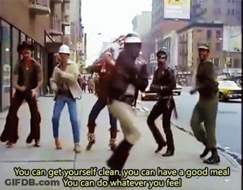 Group Dancing On Sidewalk Saying You Can Get Yourself Clean You Can Have A Good Meal GIF