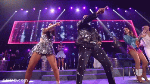 Group Dancing On Stage In Front Of ABC Sign GIF